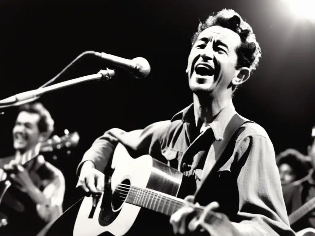 Woody Guthrie en concierto, transmitiendo pasión y energía a través de su música