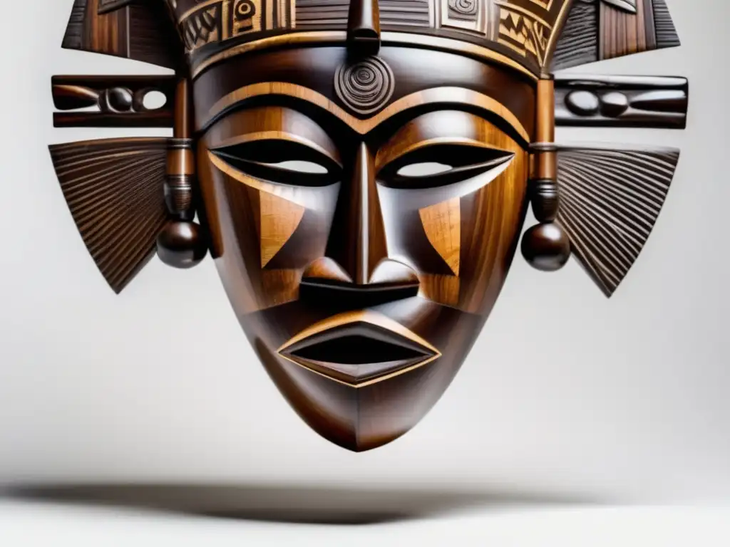 Un máscara africana tallada con patrones geométricos y motivos simbólicos, reflejando la preservación del legado africano de Amadou Hampâté Bâ